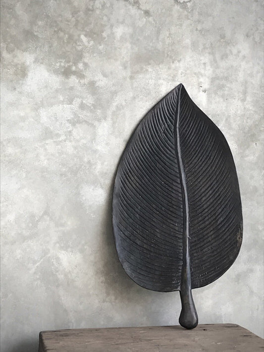 Carved Palm Leaf – A Sculpture of Stillness