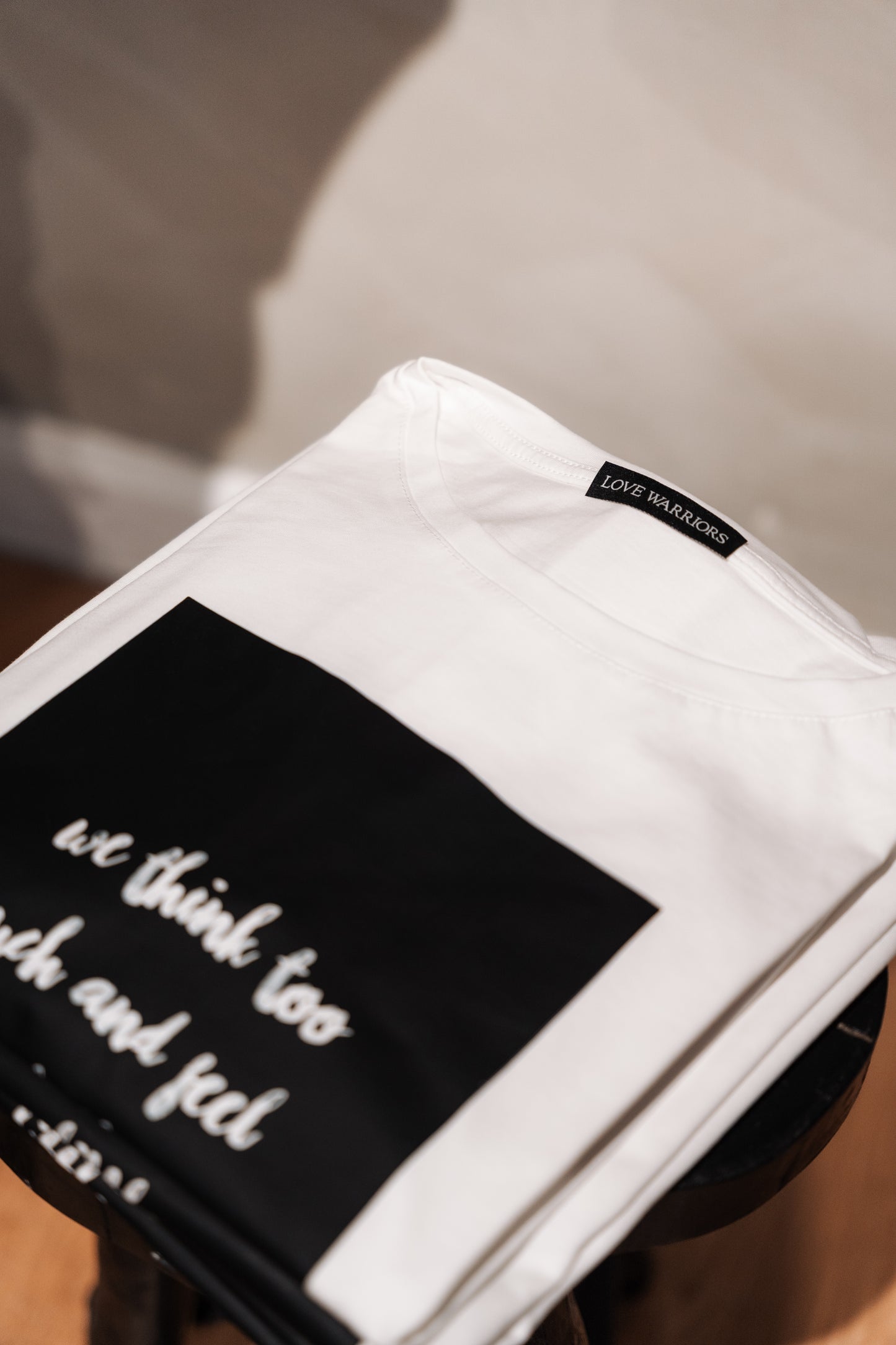 Love Warriors T-Shirt — We think too much and feel too little