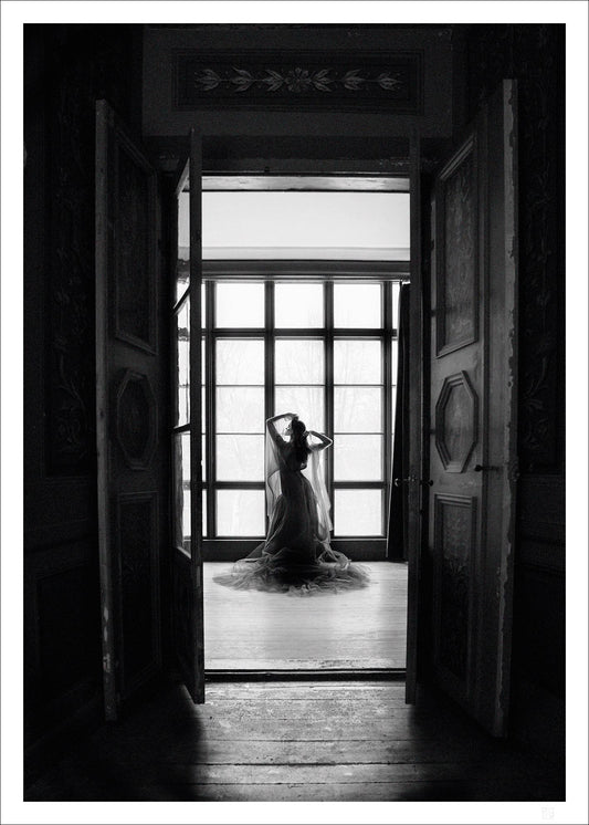 Woman in front of a window
