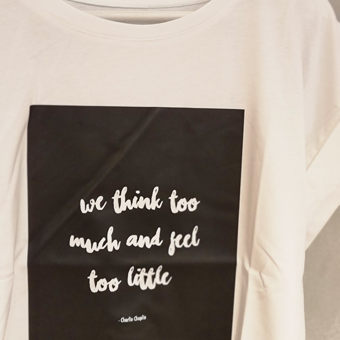 Love Warriors T-Shirt — We think too much and feel too little