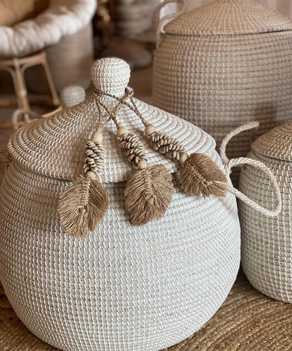 Raffia leaves with cowrie shells