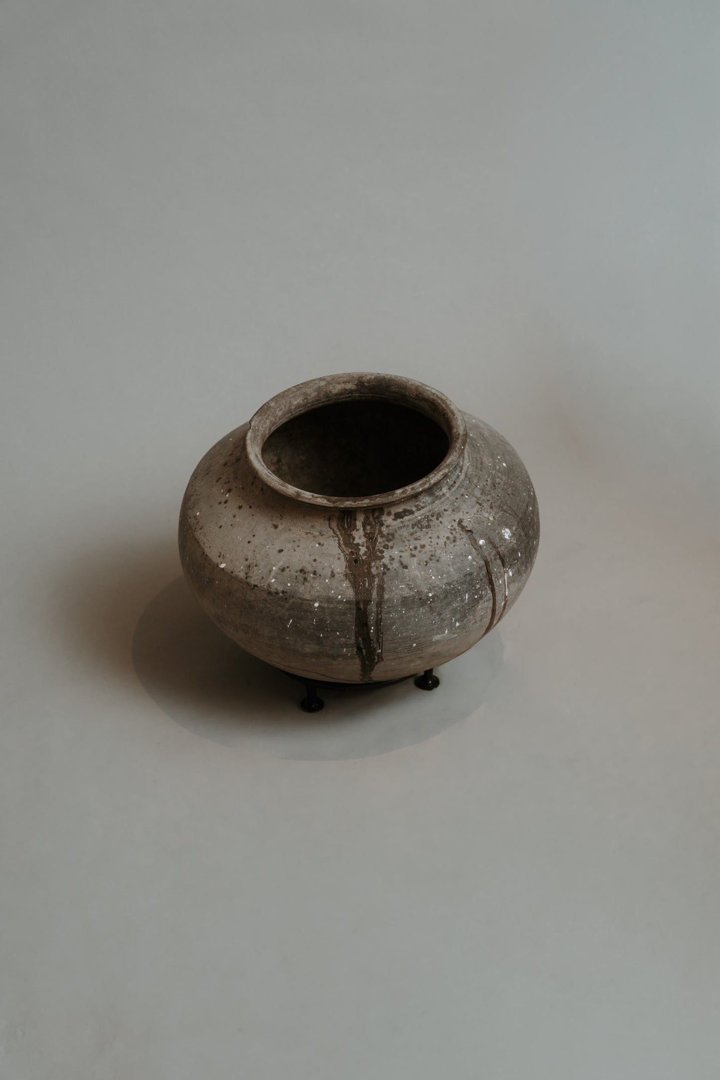 Clay Pot on Iron Stand – A Statement of Stillness and Strength