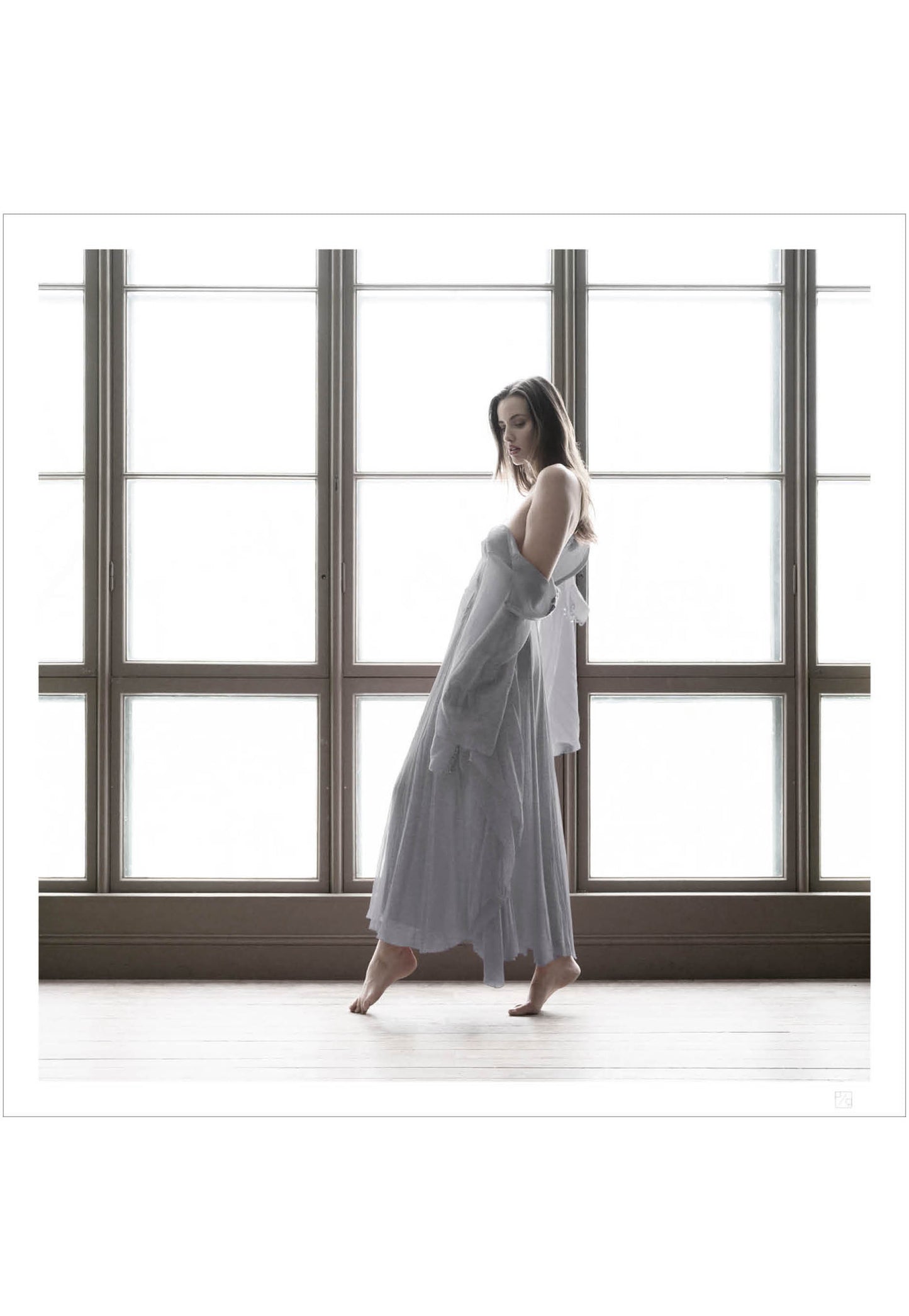 Dancing girl in silver dress