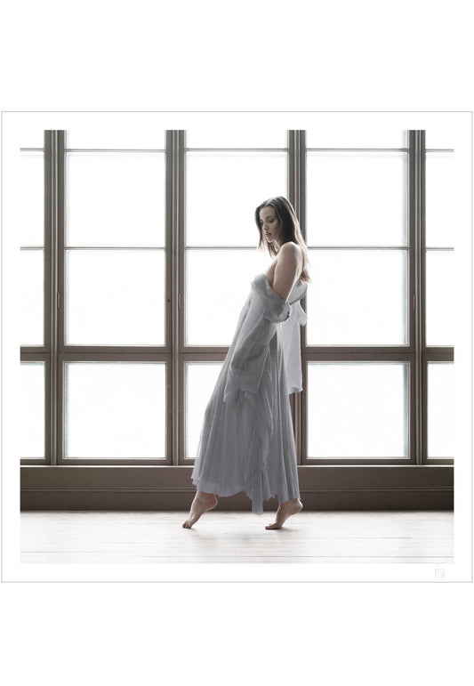 Dancing girl in silver dress