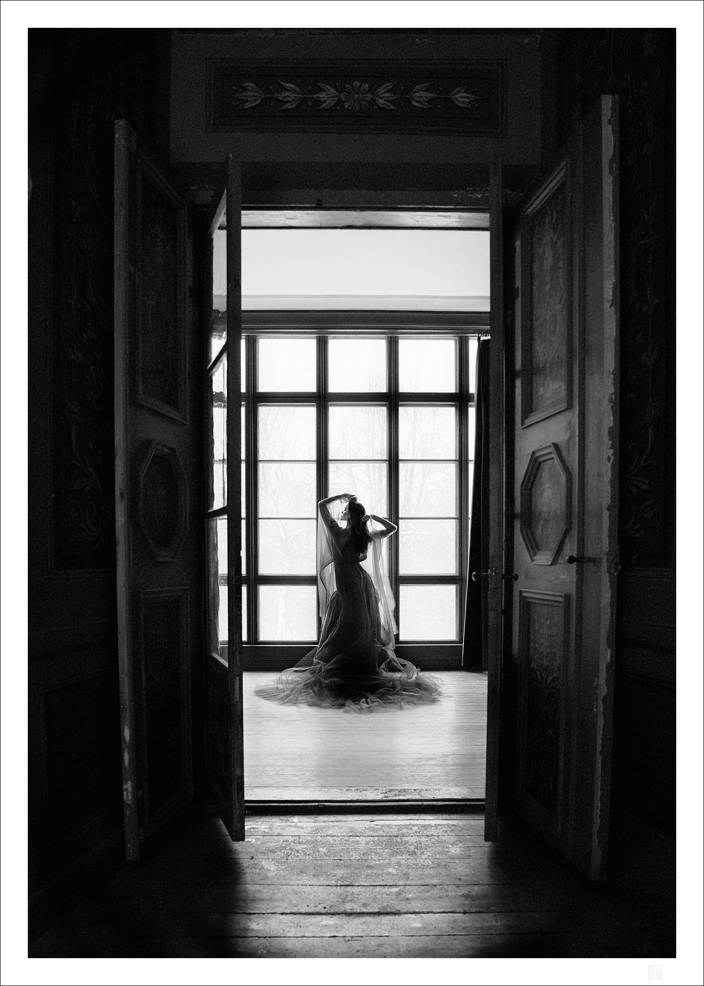 Woman in front of a window